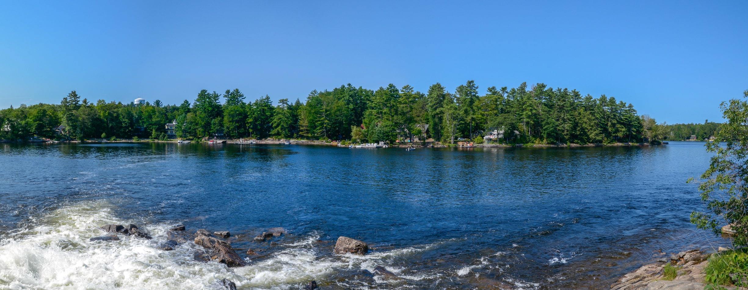 Sunny Bala Falls and forest view in Bala, ON